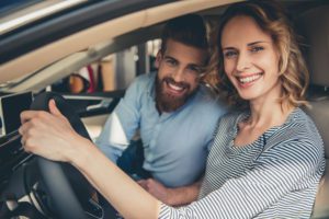 Couple Driving Together in the Car with Auto Insurance in Charlotte, NC 