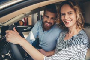 Couple Driving Together in the Car with Auto Insurance in Charlotte, NC